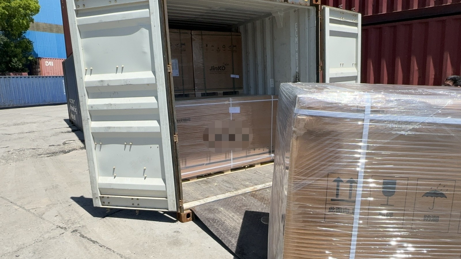 Solar panel loading in container.jpg